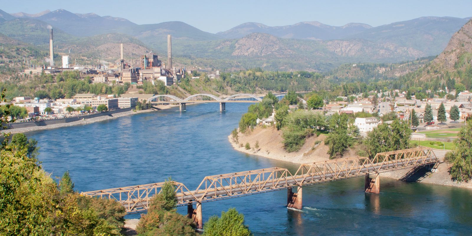 Trail, BC, with the Columbia River, the Old Trail Bridge and the Victoria Street Bridge