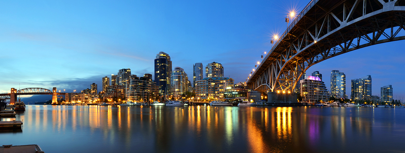 Vancouver skyline at dusk from beneath the Granville Street Bridge